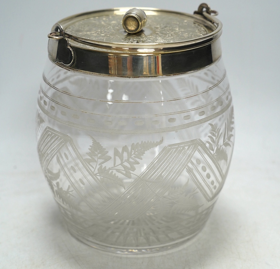 An electroplate mounted glass biscuit barrel, 16cm. Condition - fair to good